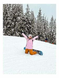 Me (Jade) snowboarding down whistler mountain. My working holiday club review was based in Whistler.